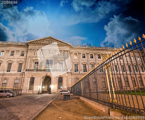 Image of Wonderful sky colors over Paris streets and ancient buildings