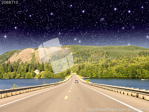 Image of Beautiful road on the lake with night colors