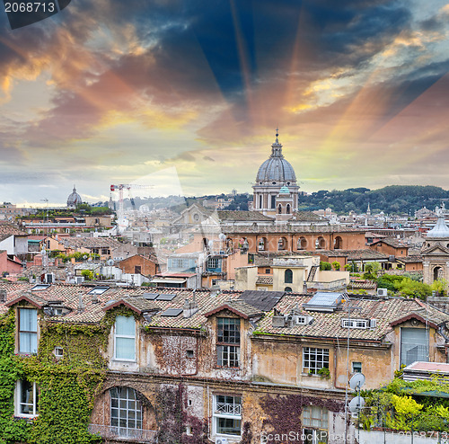 Image of Wonderful view of Rome at sunset with St Peter Cathedral