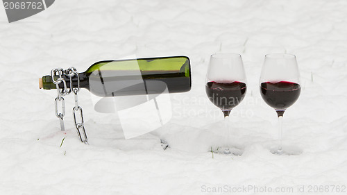 Image of Bottle of red wine and wineglasses