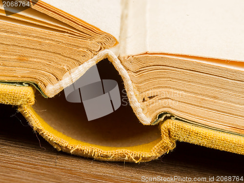 Image of Old book fanned open