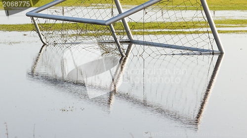 Image of Football goal in a flooded field