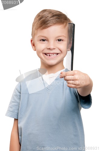 Image of Boy with comb