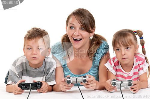 Image of Happy family playing a video game