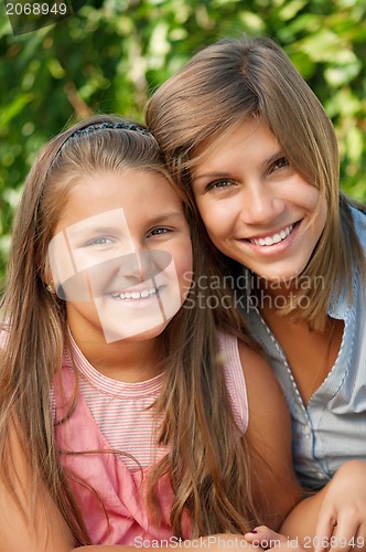 Image of Happy sisters
