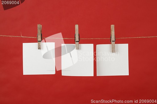 Image of Memory note papers hanging on cord