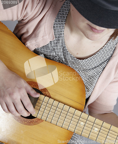 Image of Playing the guitar