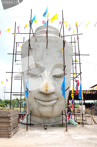 Image of Renovation of buddha face, Thailand. 