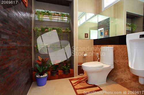 Image of Luxury modern bathroom suite with bath and wc