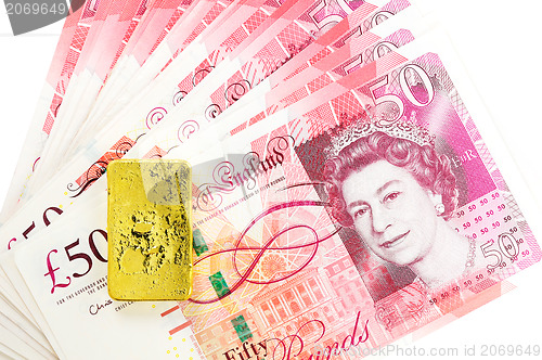 Image of 50 pound sterling bank notes closeup view business background