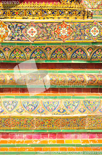 Image of The gold stucco design of native thai style on the Wall 