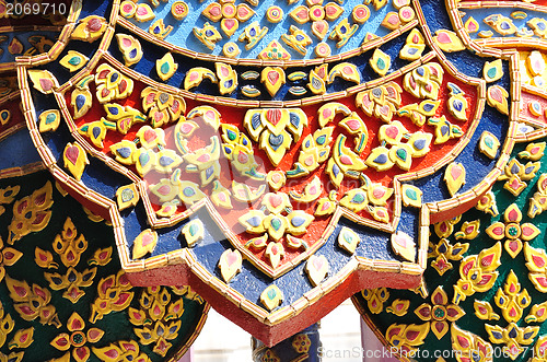 Image of The gold stucco design of native thai style on the Wall 