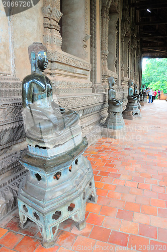 Image of Ancient Buddha sculptures in the cloister of Wat Si Saket in Vientiane, Laos 