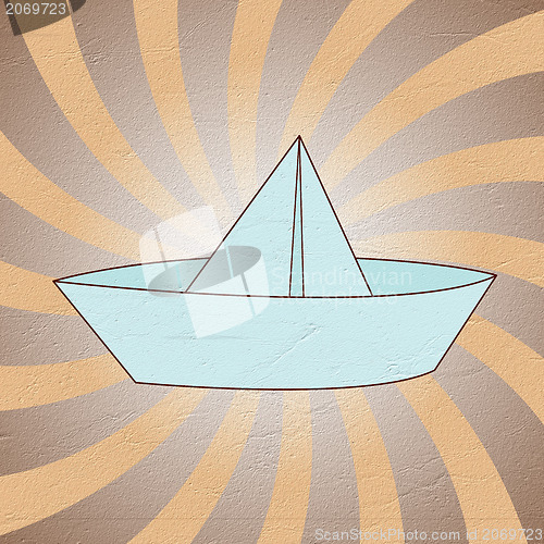 Image of origami paper boat recycled paper craft stick on  background 