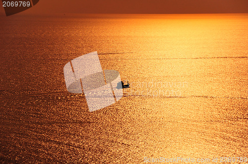 Image of sailing boat sunset at kata beach phuket 