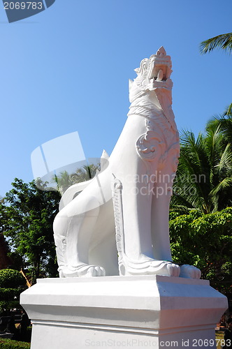 Image of White lion statue decoration in front of temple