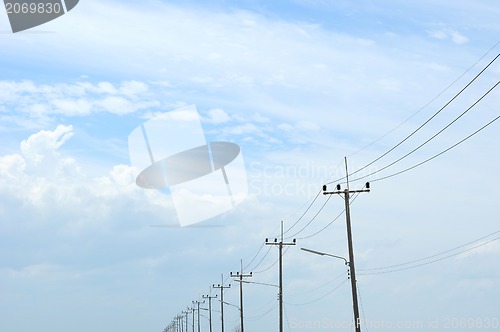 Image of High voltage tower on blue sky 