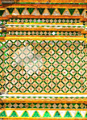 Image of The gold stucco design of native thai style on the Wall 