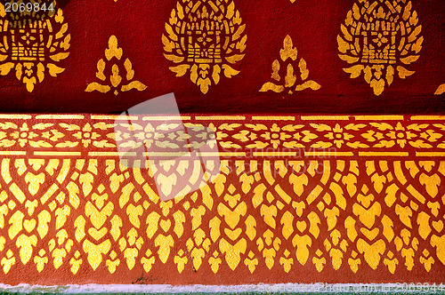 Image of The gold stucco design of native thai style on the Wall 