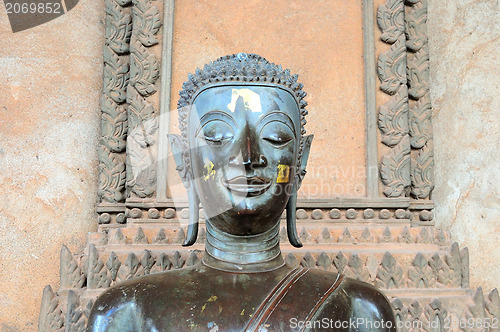 Image of Ancient Buddha sculptures in the cloister of Wat Si Saket in Vientiane, Laos 