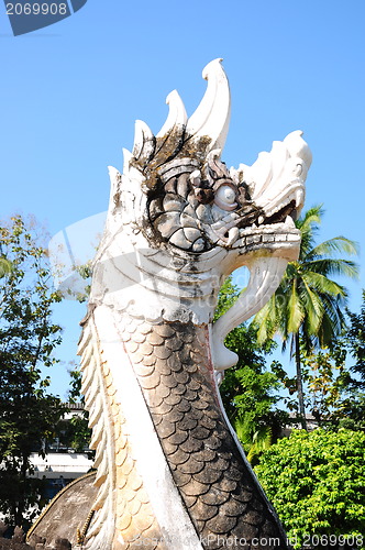 Image of White lion statue decoration in front of temple