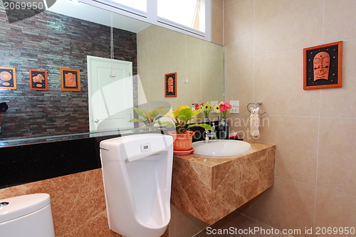 Image of Luxury modern bathroom suite with bath and wc