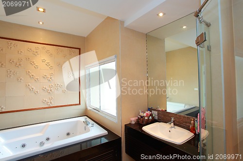Image of Luxury modern bathroom suite with bath and wc