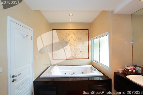 Image of Luxury modern bathroom suite with bath and wc