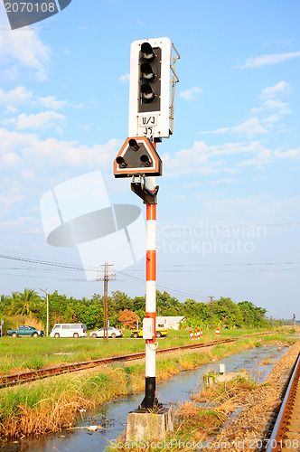 Image of Traffic light shows red signal on railway. Railway station. 