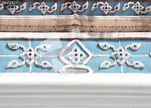 Image of The gold stucco design of native thai style on the Wall 