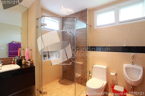 Image of Luxury modern bathroom suite with bath and wc