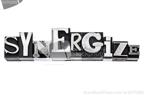 Image of synergize word in metal type
