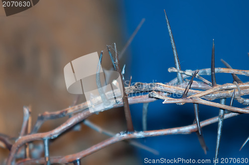 Image of Crown of thorns hung around the Easter cross