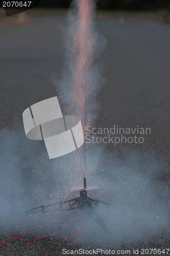 Image of flying model rocket