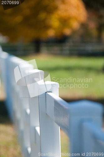 Image of white vinyl fence