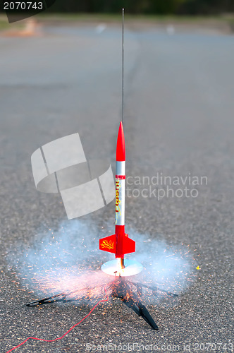 Image of flying model rocket