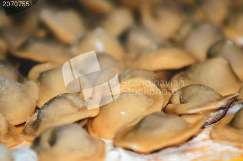 Image of Uncooked ravioli pasta prepared and ready for cooking