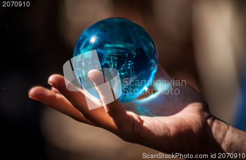 Image of crystal ball in hand
