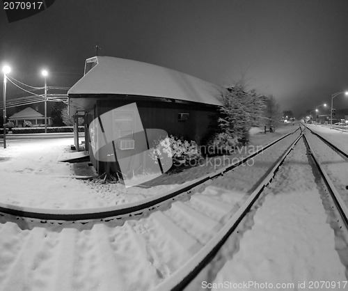 Image of snow covered train tracks