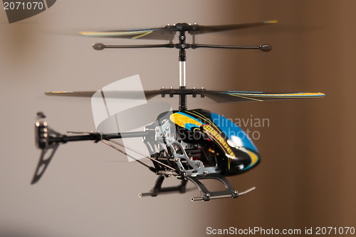 Image of Flying RC helicopter