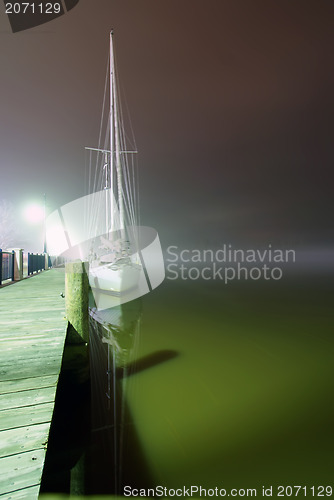 Image of sail boat parked at the pier