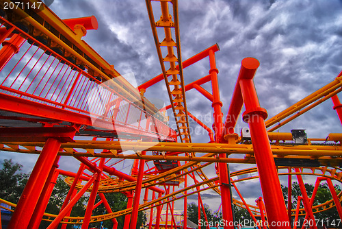 Image of Rollercoaster in amusement park in summer