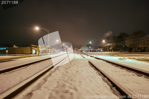 Image of snow covered train tracks