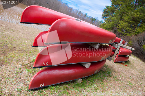 Image of red kayaks