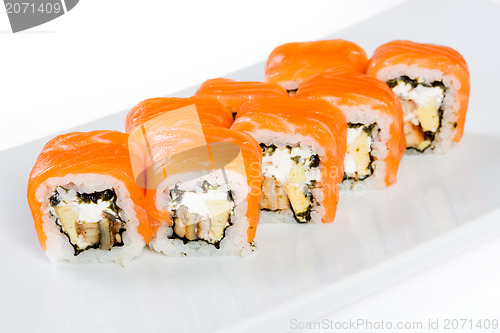 Image of Sushi (Roll unagi maki syake) on a white background