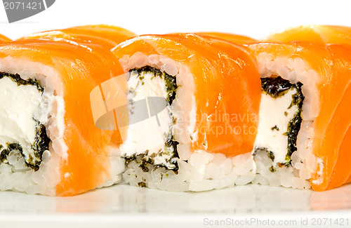 Image of Sushi (Roll unagi maki syake) on a white background