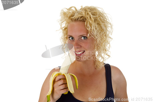 Image of Young woman with banana