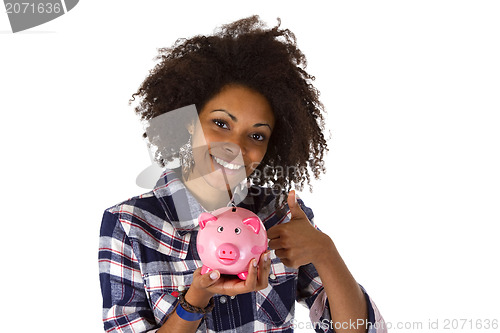 Image of Female afro american with piggy bank