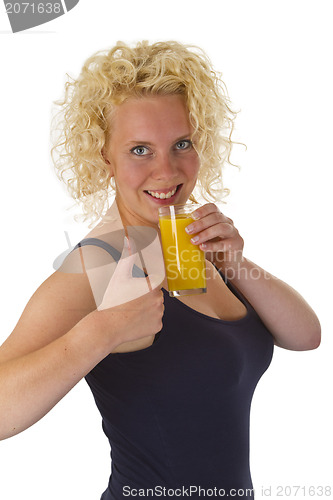 Image of Young woman with glass orange juice 