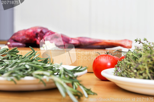 Image of Vegetables And Meat On Kitchen Counter